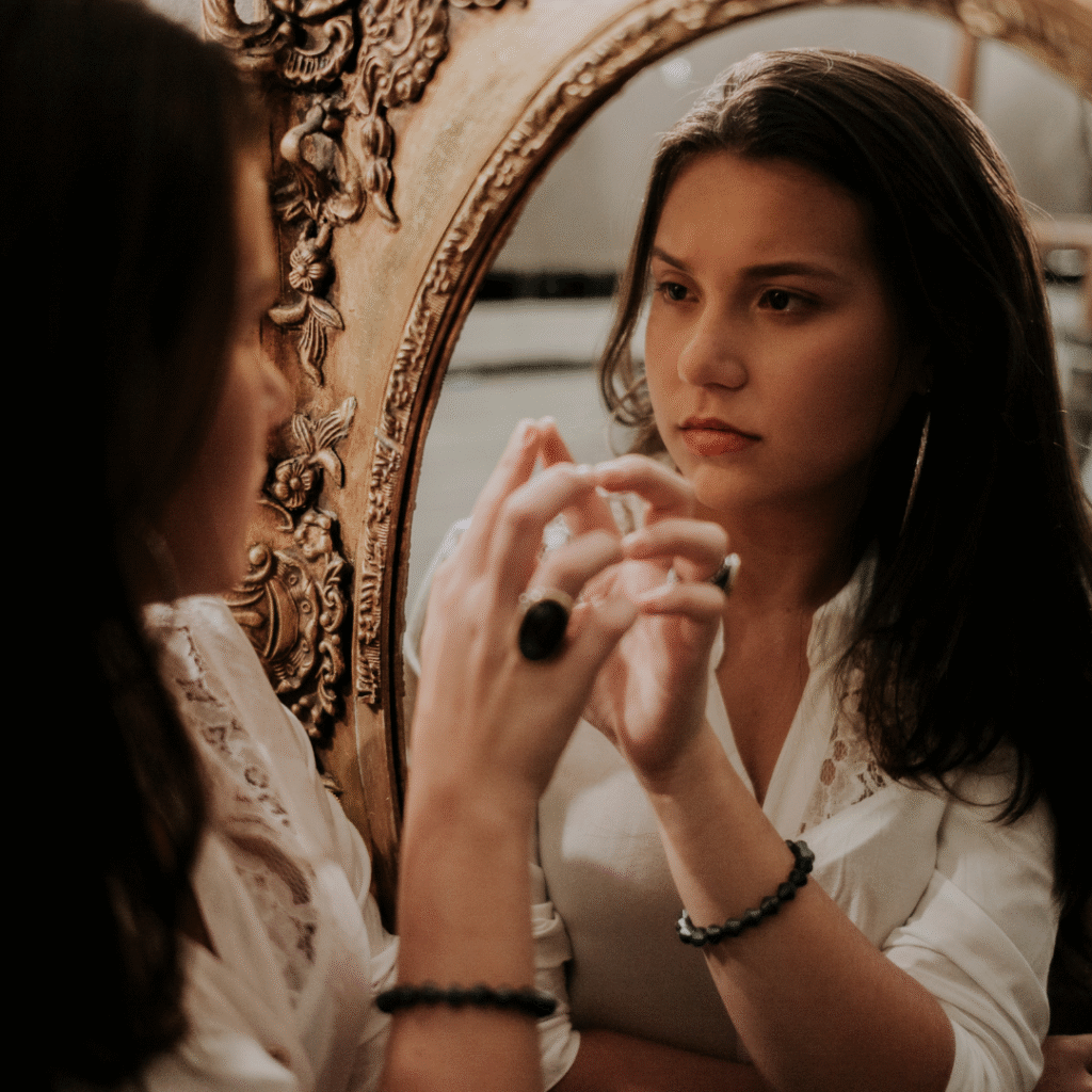 Teen Girl in front of a mirror